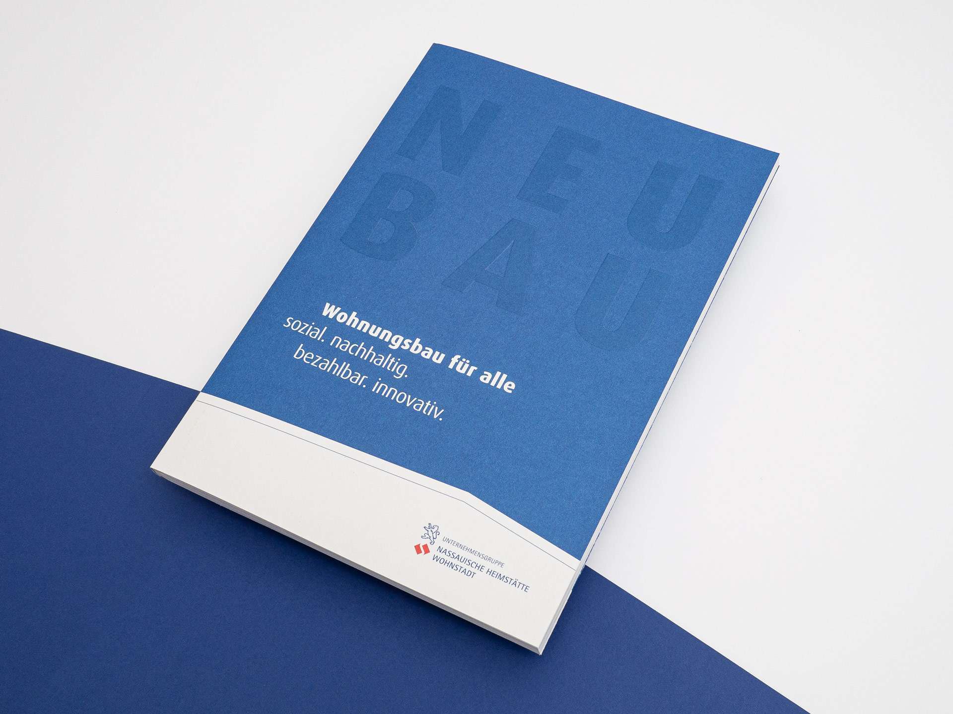 Wohnungsbau für alle – Unternehmensgruppe Nassauische Heimstätte I Wohnstadt 18 nh broschuere neubau wohnungsbau cover1